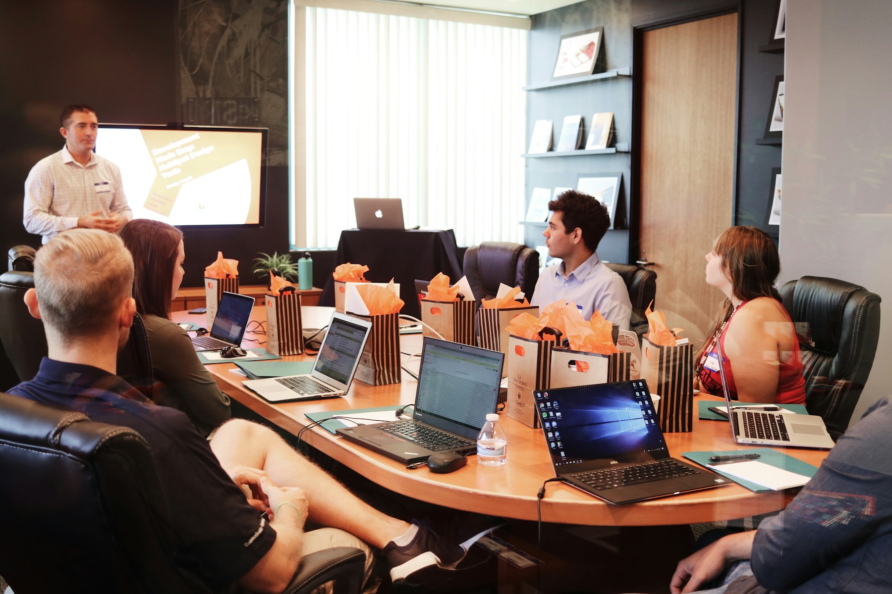 Startup team in a modern workspace collaborating on growth strategy.